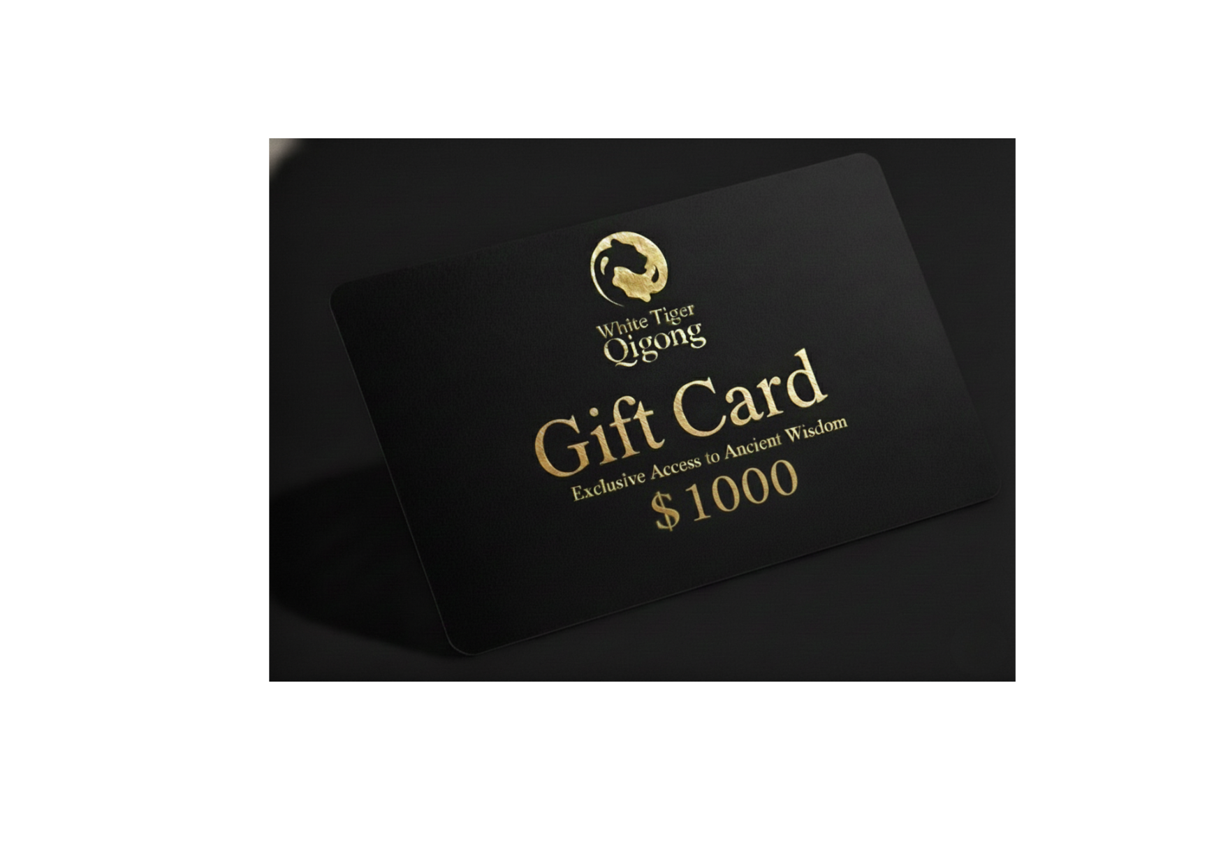 Black gift card with gold text and logo on a dark background