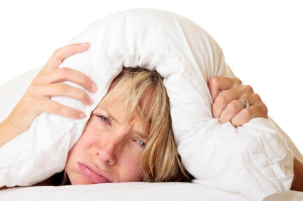 person struggling with sleep
