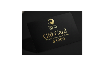 Black gift card with gold text and logo on a dark background