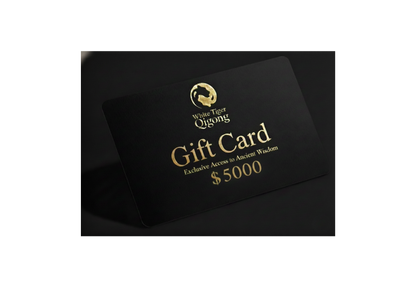 Black gift card with gold text and logo on a dark background